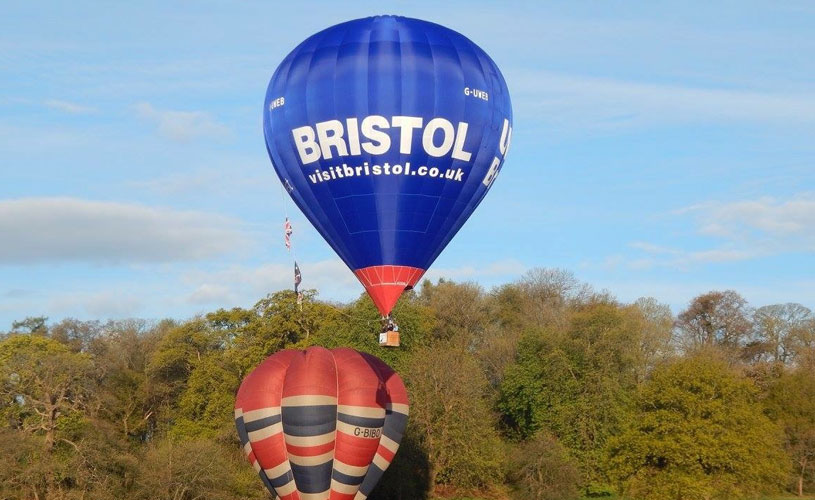 The blue Visit Bristol hot air balloon 